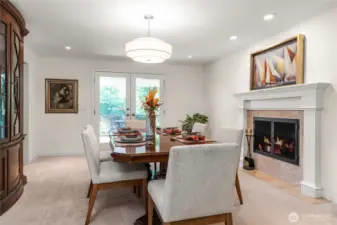 Dining room opens to covered deck for seamless indoor-outdoor flow