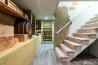 A wine cellar to boast about with built in wine racks, and cozy space for tasting