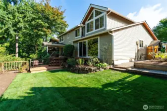 Level backyard fenced area, overlooks lower terraced yard with endless possibilities