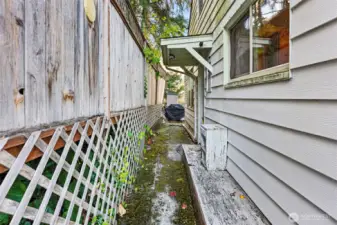 Side door entrance and path to backyard & front yard