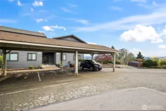 Your covered, reserved parking space is just outside your front door