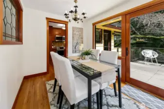 Dining area with oversized slider to expansive deck