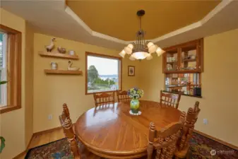 Dining Area With Partial Sound View; Storage and Pass Thru