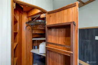 Hidden pantry. Pot and Pan holder stays.