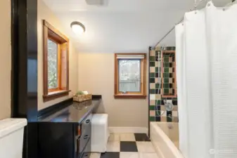 More custom tile work and vanity area in the main floor bathroom.