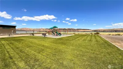 Park with big toys for kids and picnic tables to hang out at!