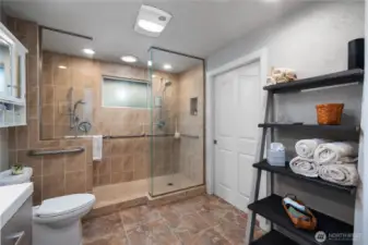Walk in shower, ceramic tile.