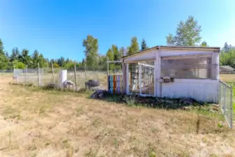 Former barn used for garden space and previously run in shed for livestock. Needs TLC.