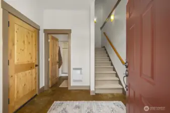 Step into the mudroom with durable concrete floors, a convenient ¾ bath, and direct access to a custom-finished 2-car garage.
