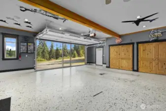 With a custom screen door, this garage doubles as a versatile living or work area.