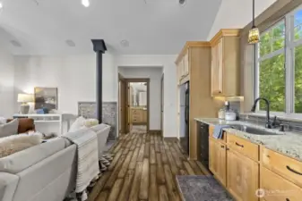 The 3/4 bath and bedroom are tucked at the opposite end of the living space for added privacy.