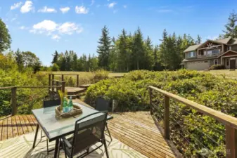 Relax on your own deck perched above the river.