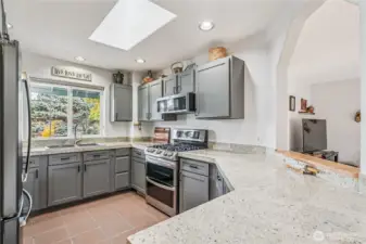 Light & Bright with a suffiecient amount of storage space and built in pull out shelving.