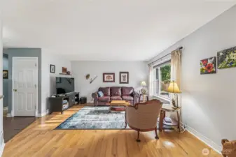 Instantly inviting living room is bright and spacious.