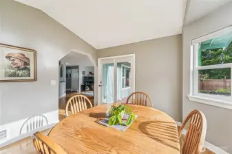 Spacious dining room would be great for hosting. Large patio located just outside the dining room double doors.