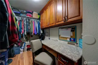 Primary Closet with built in desk