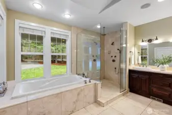 Beautiful 5 piece ensuite with a private water closet, dual-head shower, and a dedicated laundry closet ready for a washer and dryer.