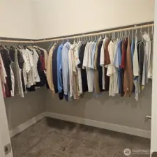 Master closet, picture is of the right side of the closet.