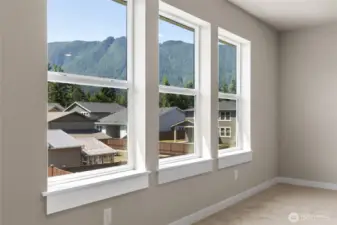 Take in the surrounding views from your flexible bonus space. Incredible views of Mt Si from the neighborhood.  Views and outlooks vary per lot/plan! Picture taken from neighboring home. View vary per lot. See site agent for details.