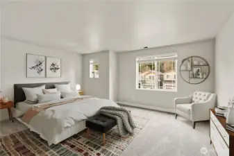 The primary suite is separated from the other two bedrooms, providing privacy and space. (Virtual Staging)