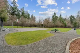 Community amenities include an athletic court, playground and even a dog park for your furry best friends.