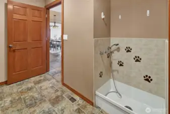 Dog wash in laundry room.