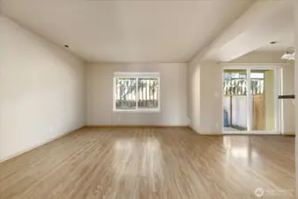 Living room, dinning room with slider to back patio.