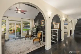 Curved doors bringing light into the hallway and entryway. Let's go explore the upper level.