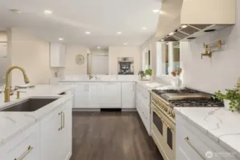 The perfect space between islands and cooking stations which allow for many hands busying in the kitchen.