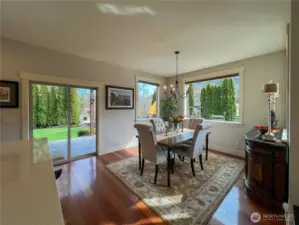 Dining Room off the Kitchen with sliding glass door and easy access to outdoor spaces.