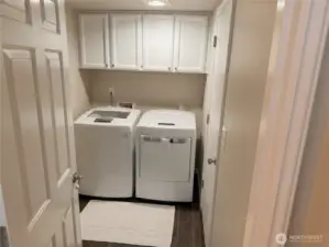 Large laundry room.  Washer and dryer stay!