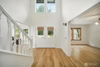 Beautiful authentic white oak floors will greet you upon entry and throught the home.Room to right has the potential to create a bedroom on the main. Doors are available for this option