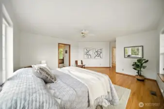 Priamary bedroom is located on second floor and is generous in size and the ajoining bath is through the door on the left.