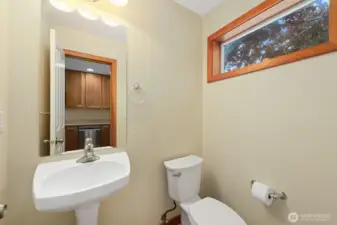 Half-Bath on the second floor just off the Kitchen.