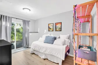 The daylight basement can be a large secondary suite or used as a bonus room, office or whatever you need. The sliding glass doors lets in natural light & leads to the backyard