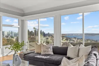 A wall of windows in living room to enjoy the SW city and sound views.