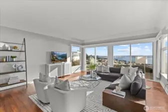 10 foot, cathedral ceilings provide volume and light in the showstopping living room on main floor.