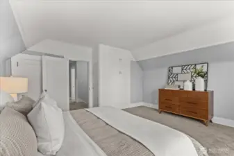 High ceilings upstairs make every room feel large.