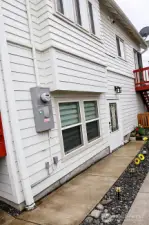 Lower level separate entry. Photo virtually enhanced to illustrate entry visibilityvisibility