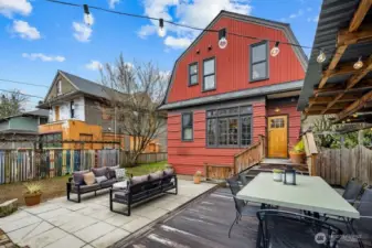 Directly off of the kitchen is the outdoor entertaining space of your dreams