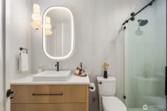 Fully tiled 3/4 bath off main floor bedroom