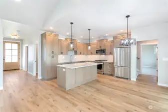 Quartz countertops, tile backsplash and high-end appliances...