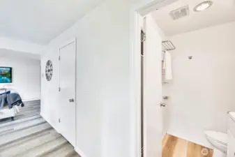 Right next to the main floor bath is a generous storage closet for convenient organization.