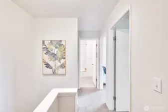 Upstairs has three spacious bedrooms and a full bath.