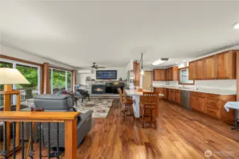 This house just feels friendly and open with the living room that looks through to the living room and out the windows to the Trex deck and gorgeous views.