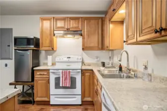 The kitchen was completely remodeled when the upstairs kitchen was done, all custom cabinets that match the upstairs. New electrical panel was installed at the time of the remodel.