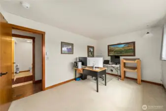 One of the two downstairs bedrooms, currently being used as an office.