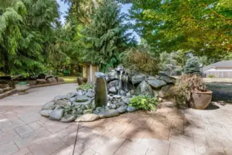 Fountain with shed behind