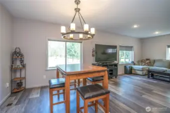 Open dining area flows into the living room, perfect for gatherings.