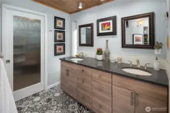 Primary bathroom has walk in shower and huge closet.